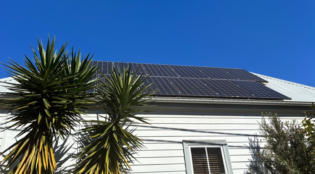 image of solar panels on a steep domestic roof